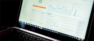 Website performance figures on a laptop screen